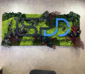 Natural plants and moss with logo for ISPDD, Dubai
